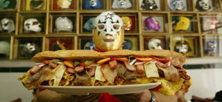 Illustration for article titled SnackTAYku International: The Wrestling Torta